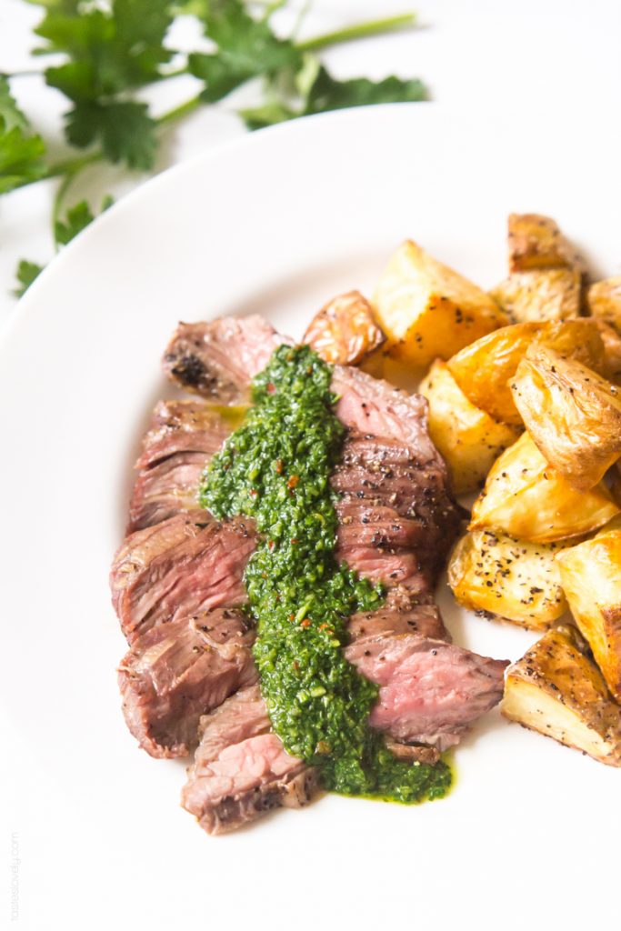 Skirt-steak-with-chimichurri-sauce-a-delicious-and-affordable-steak-dinner-topped-with-a-cilantro-parsley-mixture.-paleo-whole30-glutenfree-lowcarb-1