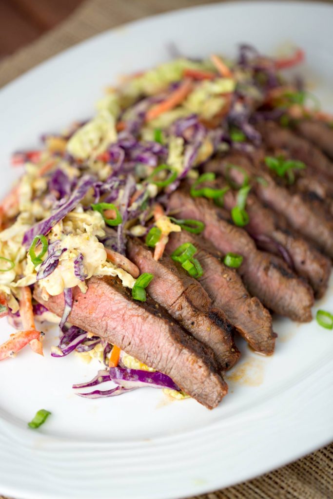 marinated-grilled-flat-iron-steak-sliced-and-served-with-coleslaw